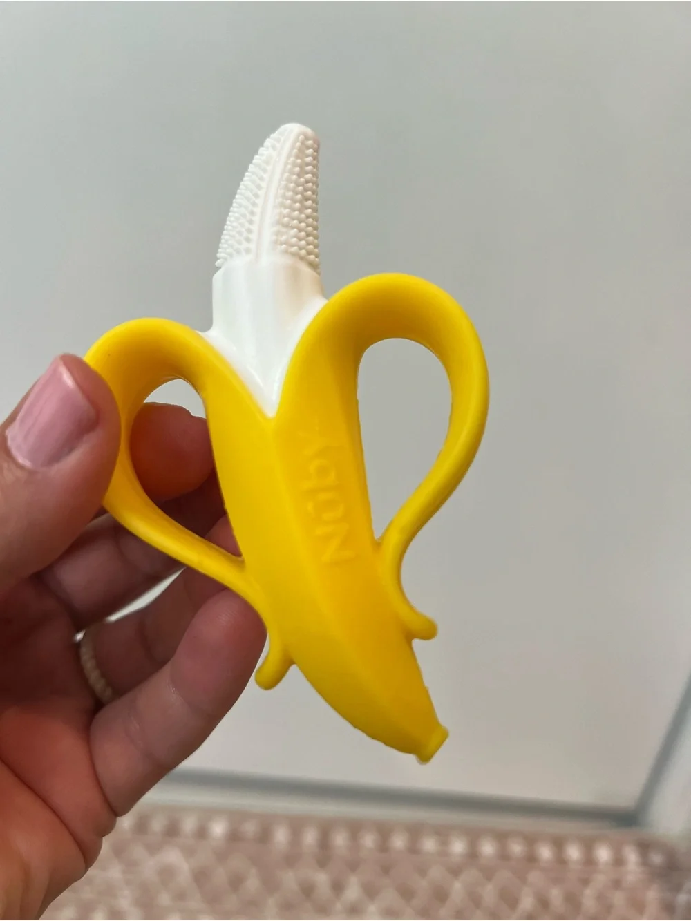 Nuby teething ring, necklace, Yellow Banana Silicone Finger Toothbrush for Kids